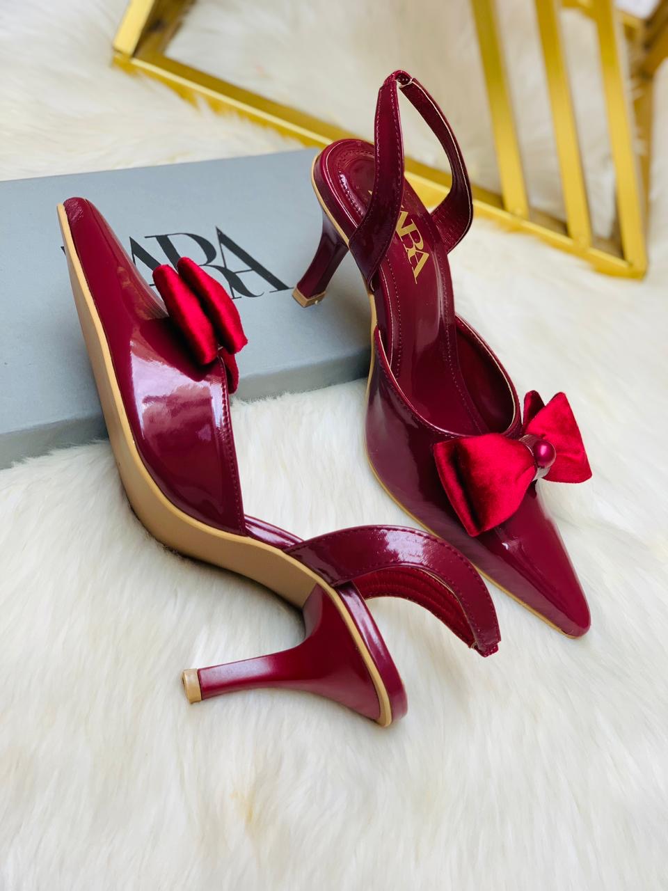 Pointed tie bow heels