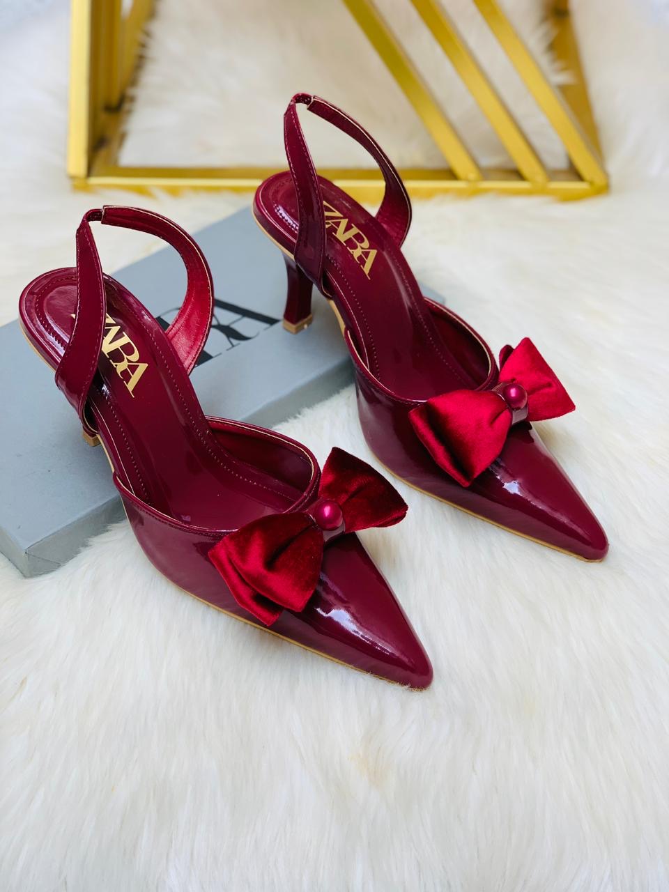 Pointed tie bow heels