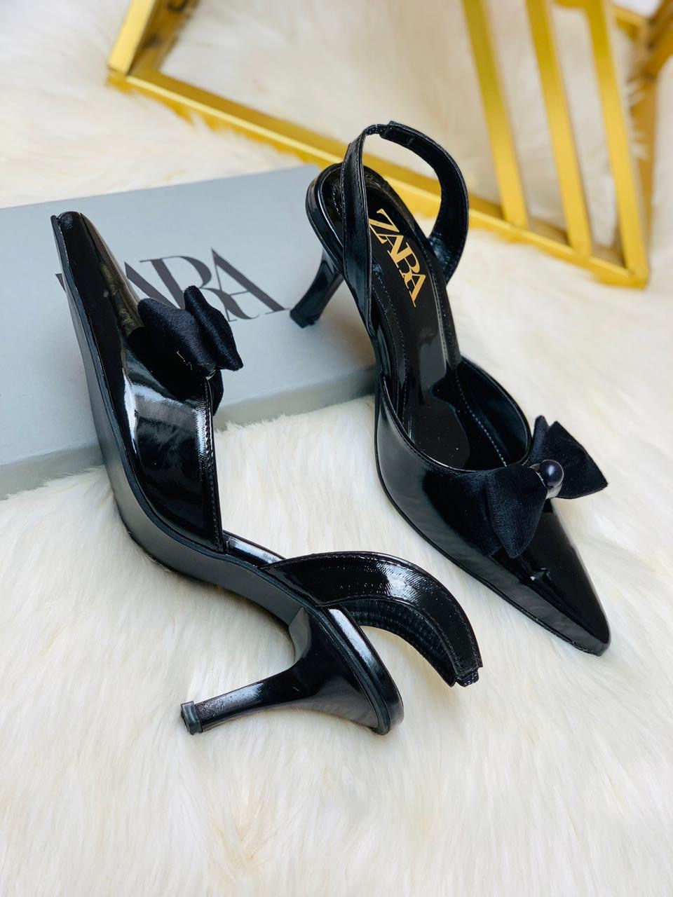 Pointed tie bow heels