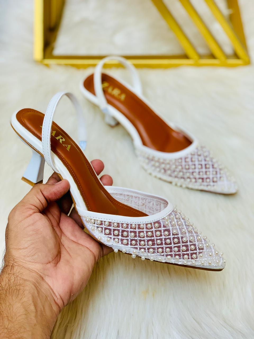 Pearl heels